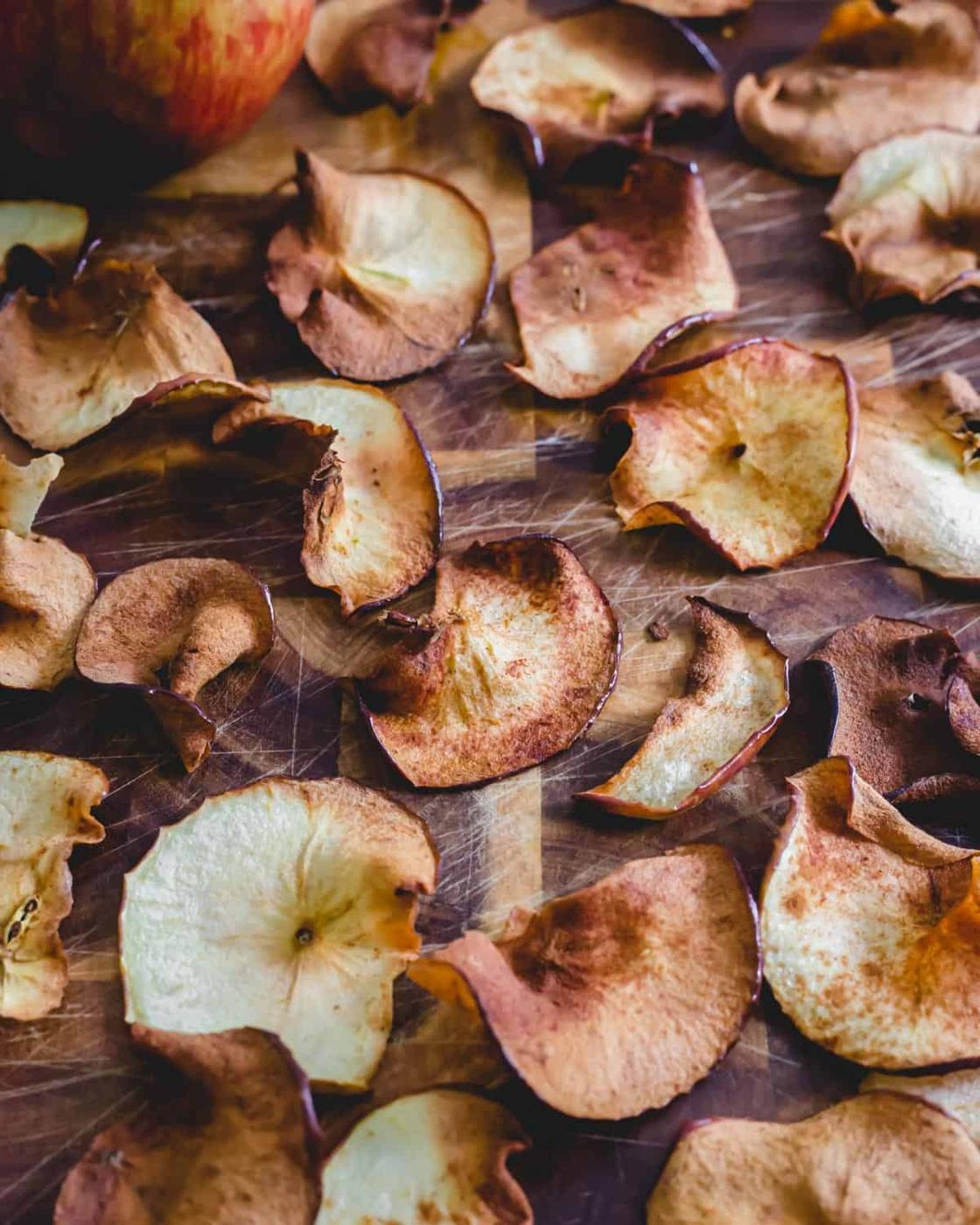 Air fried apple chips brushed with maple syrup and seasoned with cinnamon.