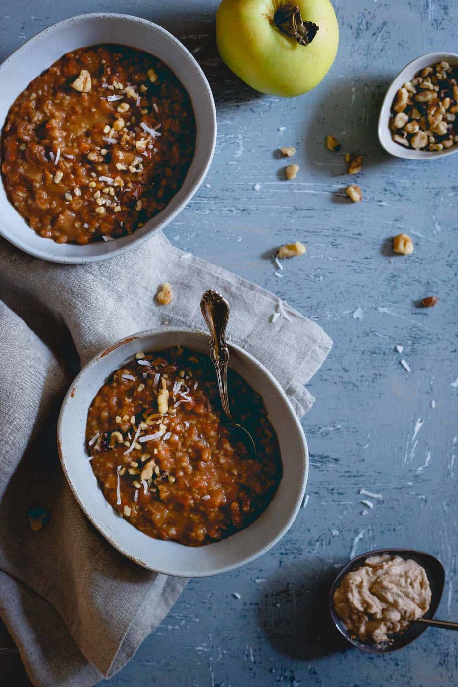 Put this slow cooker apple butter carrot cake oatmeal together the night before and wake up to a cozy fall breakfast!