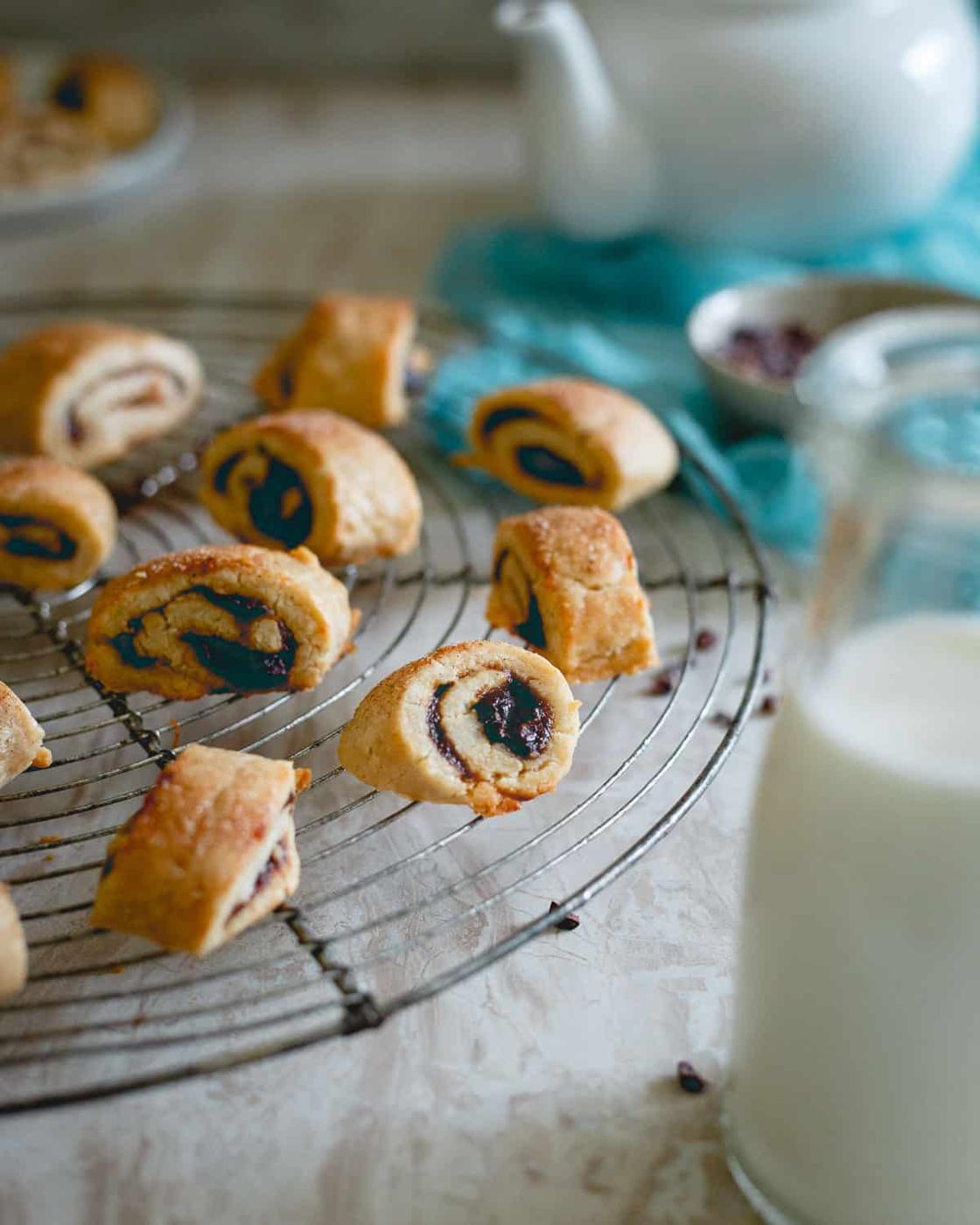 Apple butter filled rugelach on a wire rack.
