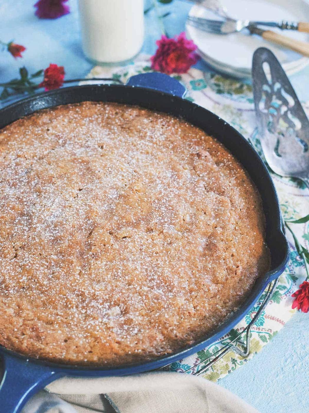 Made with applesauce, golden raisins and apple cider, this easy skillet cake is the quintessential fall dessert.