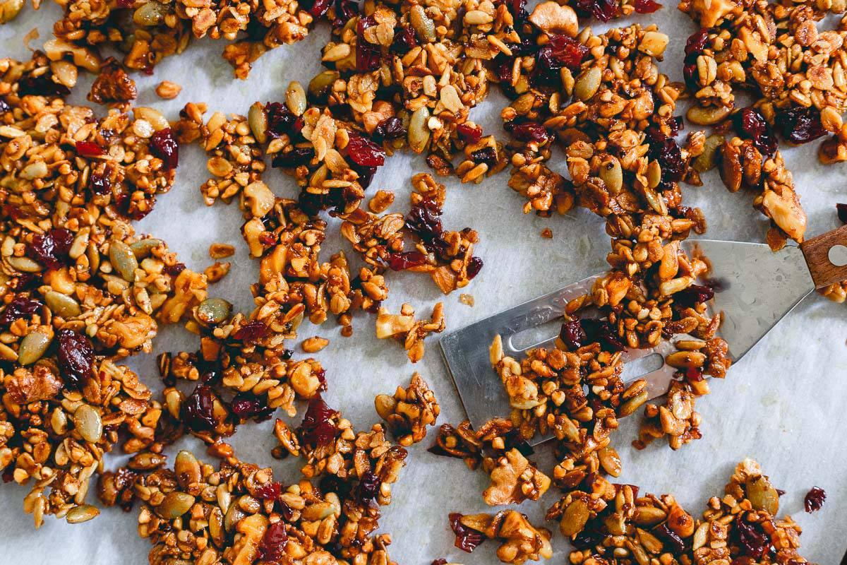 Savory tart cherry granola is the perfect crunchy addition to this bay scallop and baby kale salad with grilled corn.