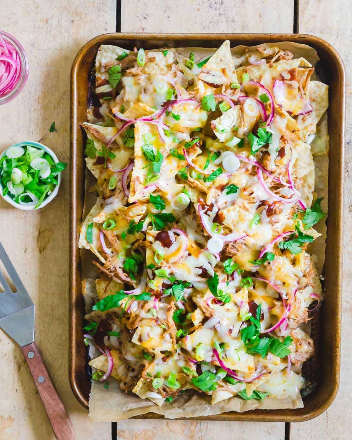 A delicious cheddar cheesy BBQ pulled pork recipe that's an easy crowd pleaser and perfect for game day.