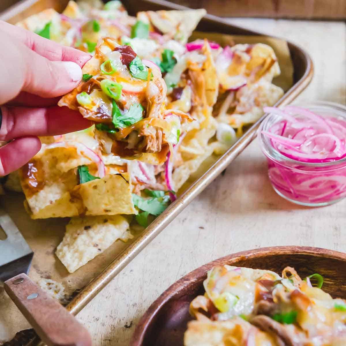A simple recipe for BBQ pulled pork nachos, great for game day or any party get together.