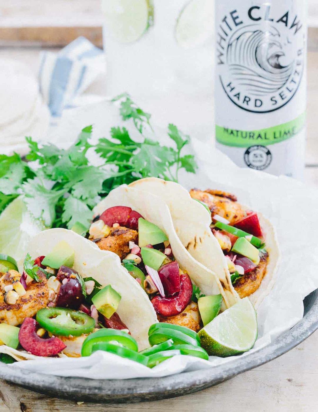 Blackened Shrimp Tacos with Grilled Corn Cherry Salsa is a simple summer meal packed with flavor.