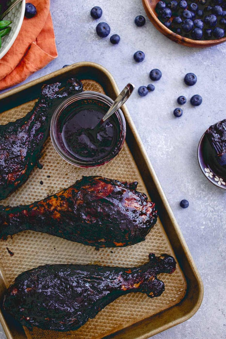 Easy, healthy and with an ingredient list you'll be happy to feed your family, these blueberry balsamic BBQ turkey legs are a great summer meal!