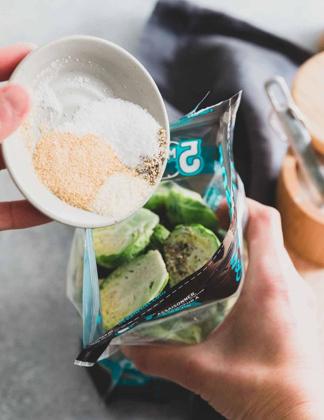 Brussels sprout halves get seasoned directly in the microwave steam bag, cooked for 5 minutes and then they're ready to be made into creamy brussels sprout soup!