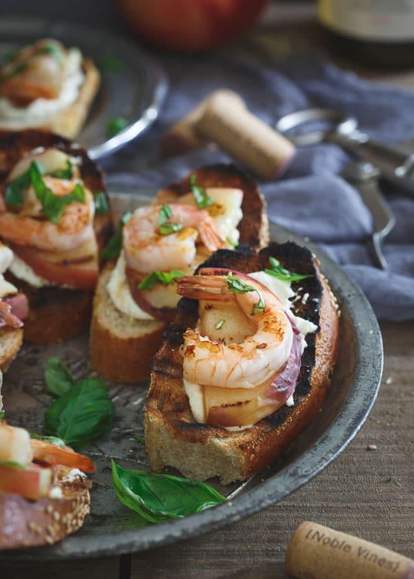 Whipped Lemon Burrata Crostini with Grilled Shrimp and Peaches