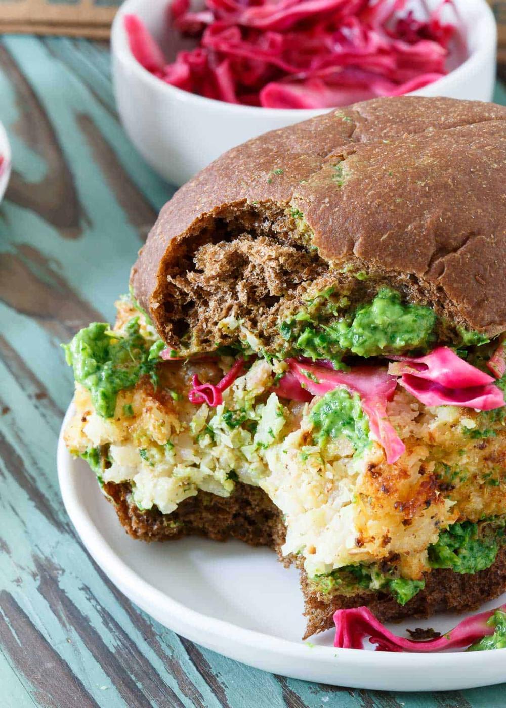 These vegetarian Cauliflower Burgers are stuffed with sharp cheddar cheese an rice for a delicious spin on a veggie burger.