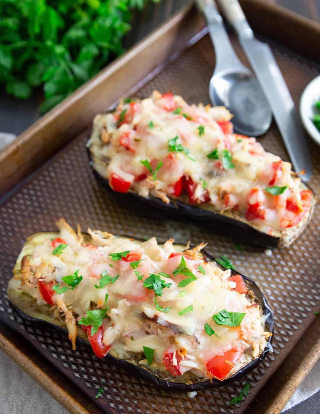 This easy stuffed eggplant recipe with chicken and cheddar cheese is a great dinner option everyone will love and can be made in 30 minutes.