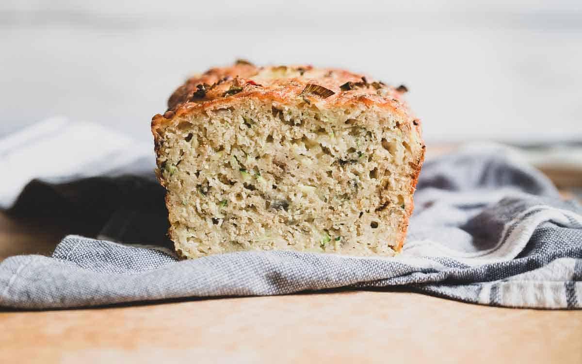 Hearty zucchini cheesy bread with savory red onions and spicy pepper jack cheese.