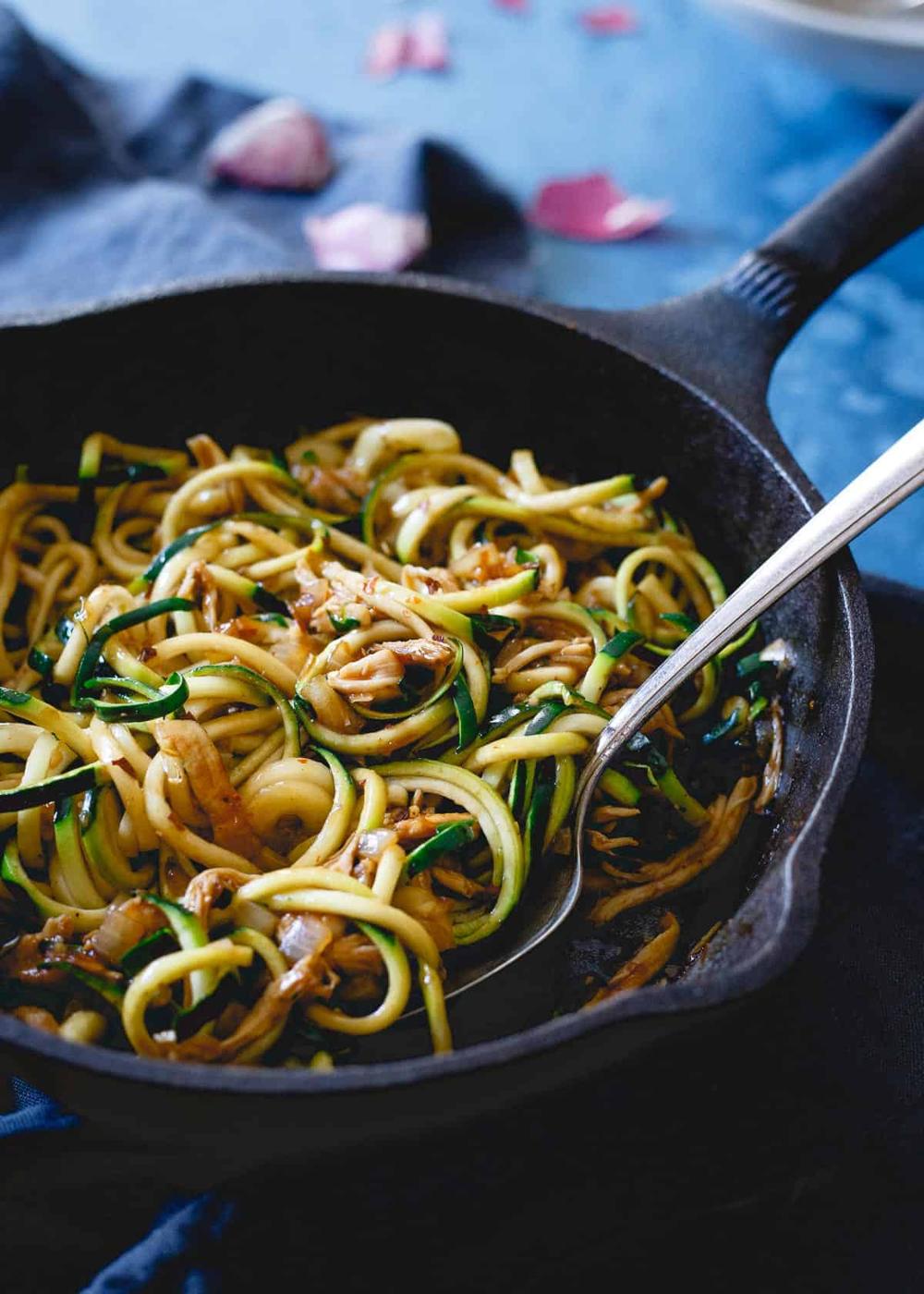 New Years is the perfect time to pick up a spiralizer and make healthier versions of your favorite takeout meals like this Chinese chicken zoodle dish!