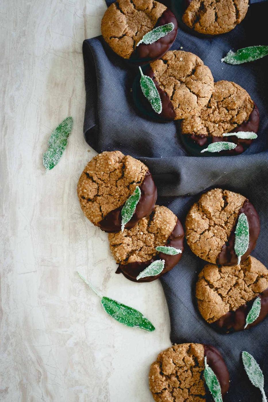 Add these chocolate dipped cashew almond butter cookies with candied sage to your holiday cookie plans!