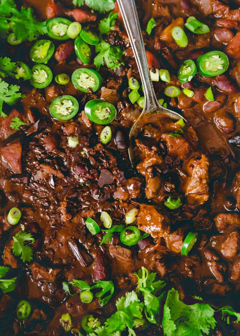 Decadent lamb chili made with cocoa powder and bittersweet chocolate with smoky spices and a mixture of beans.