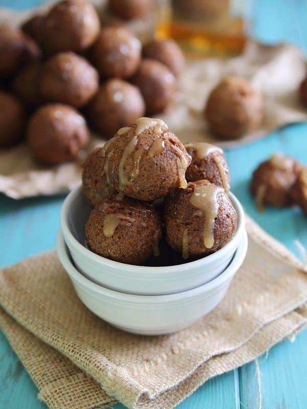 These classically fried chocolate pumpkin donut holes are topped with a sweet amaretto glaze!
