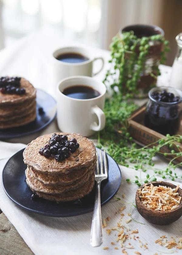 These cinnamon raisin oat bran pancakes have a combination of oat bran and buckwheat for a hearty texture with a touch of nutty toasted coconut.