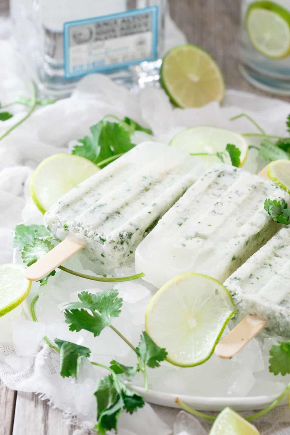 These coconut cilantro margarita ice pops are a refreshing and boozy bite. What better way to do happy hour than with a margarita ice pop?