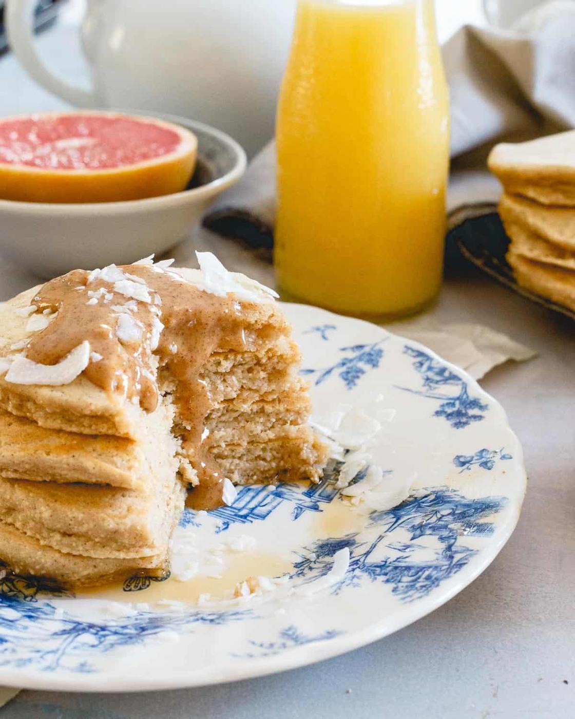 A careful mix of coconut and spelt flours results in a perfectly moist, doughy pancake stack everyone will love.