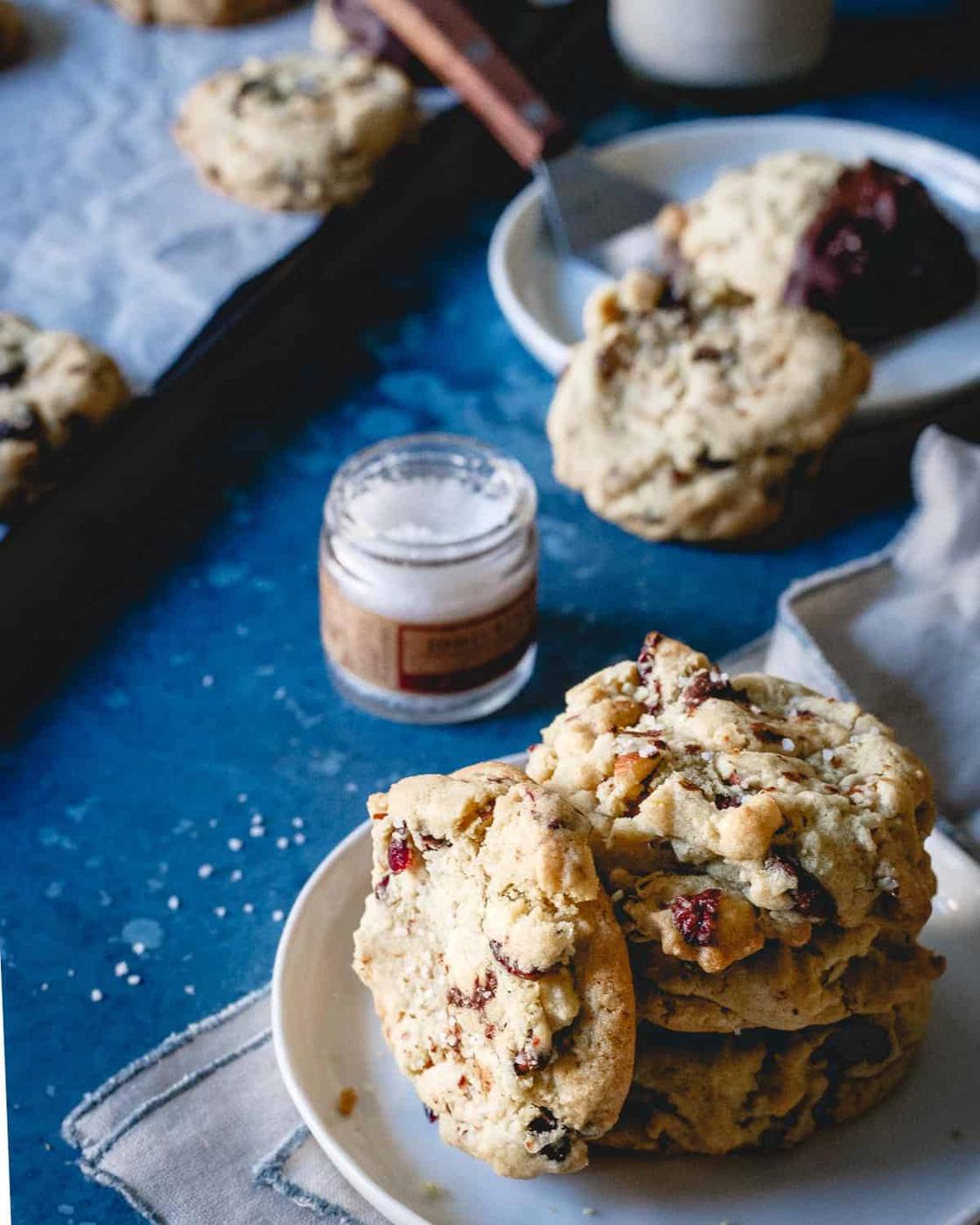 A glass of milk and a couple of these cranberry almond chocolate chip cookies is the perfect holiday inspired treat.
