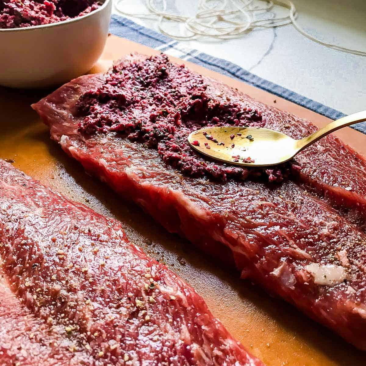 Butterflied lamb stuffed with cranberry pesto.