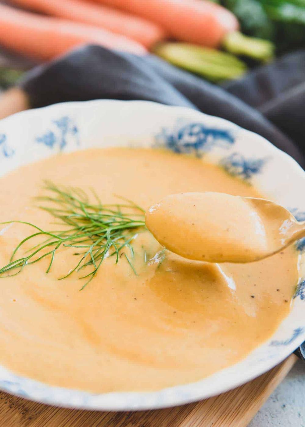 This easy carrot soup recipe is thick, creamy and filling. Dairy-free and vegan too!