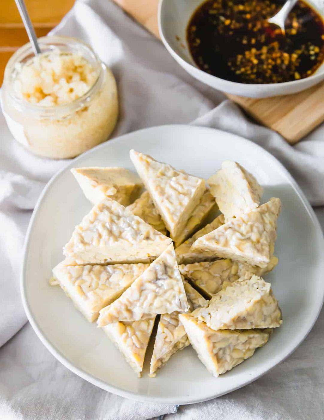 Tempeh triangles ready to be marinated in tamari, maple syrup, balsamic, oil and garlic.