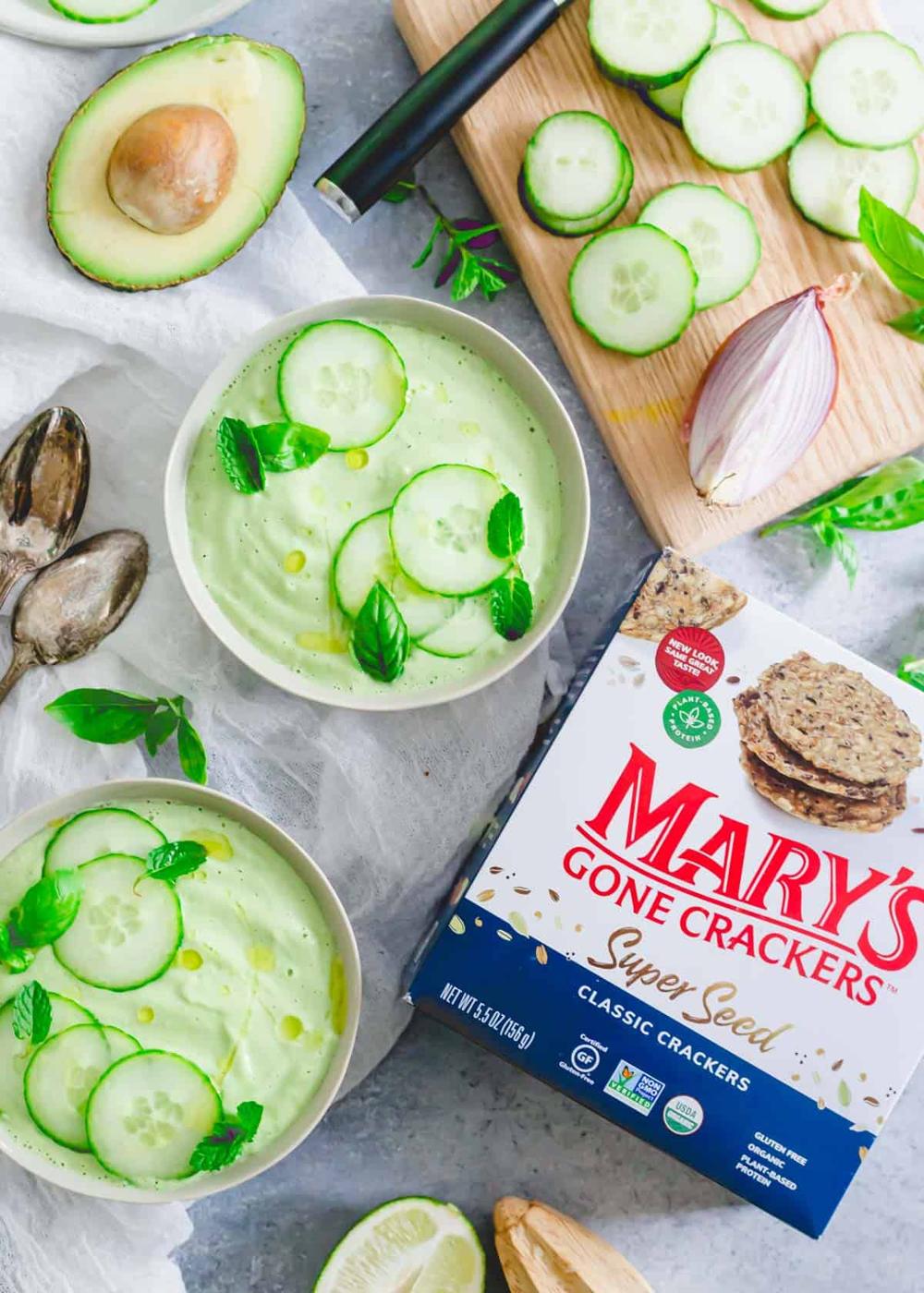 Cucumber gazpacho alongside Mary's Gone Crackers for serving.