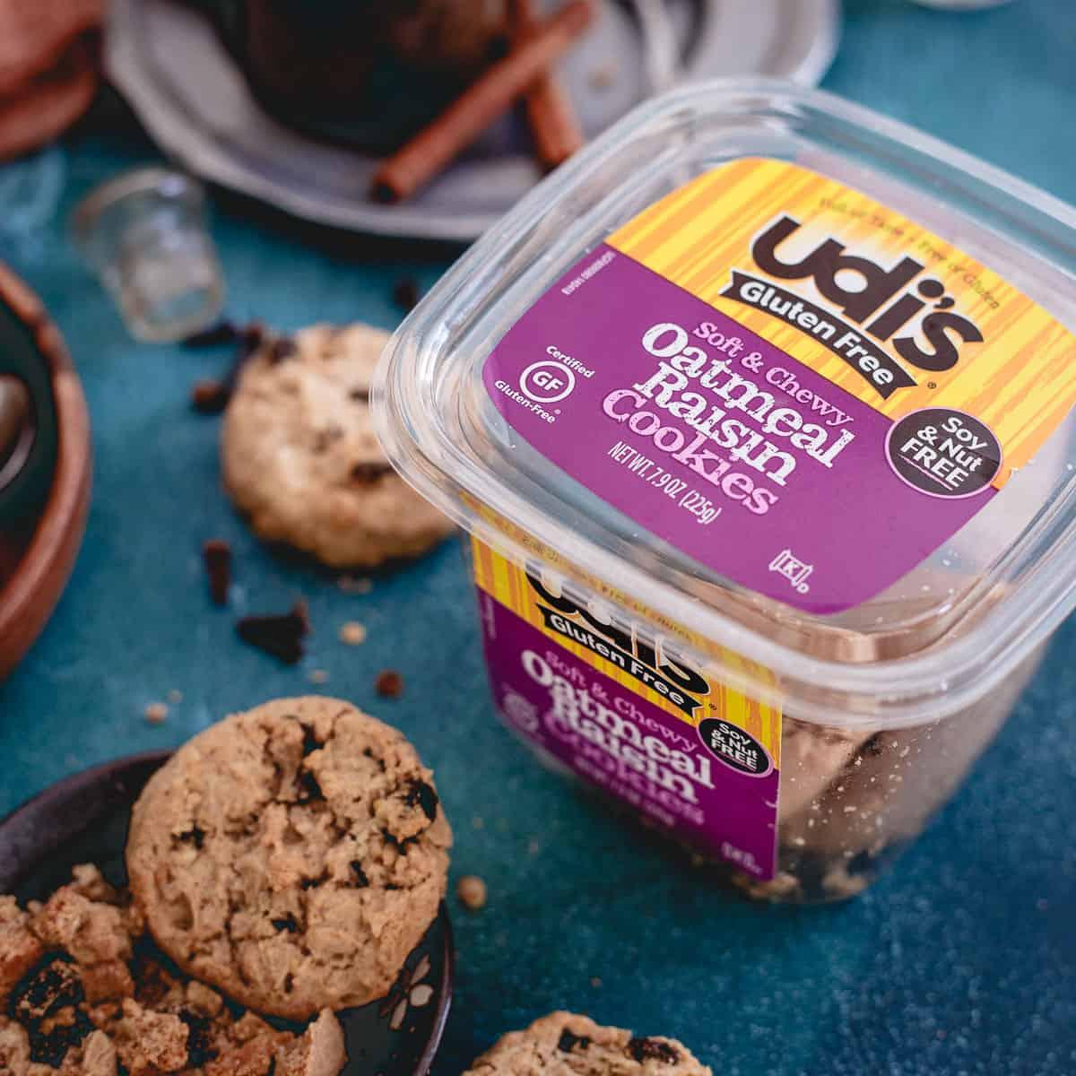 Udi's gluten free soft and chewy oatmeal raisin cookies are the perfect topping to this dirty chai tapioca pudding.