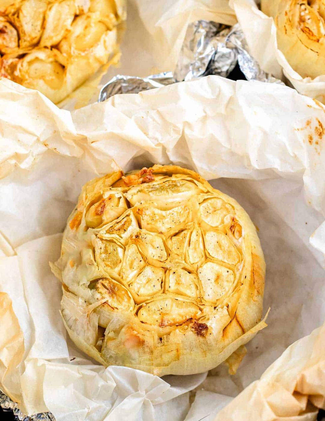 A head of roasted garlic in an air fryer.
