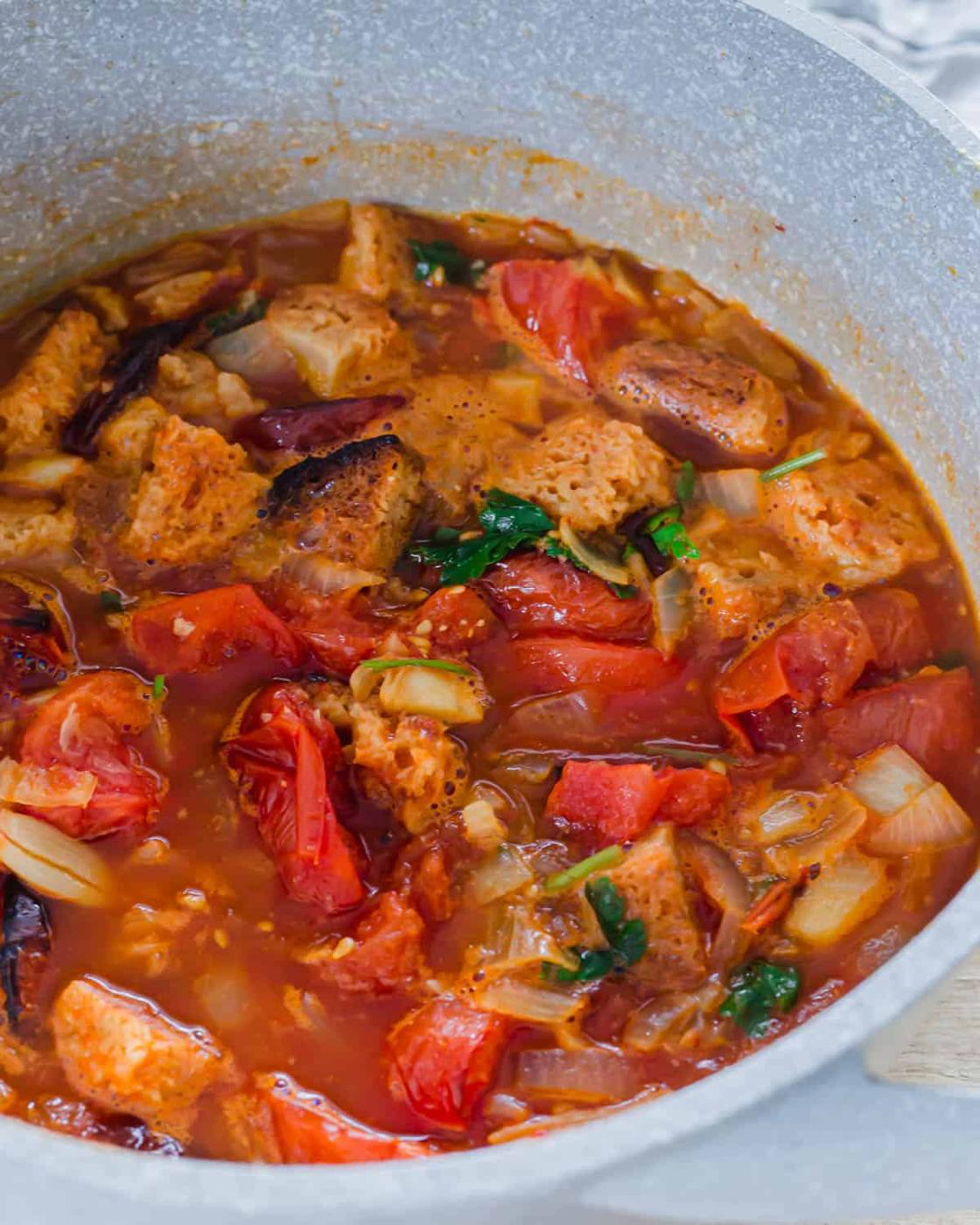 Roasted tomato basil soup in a pot.