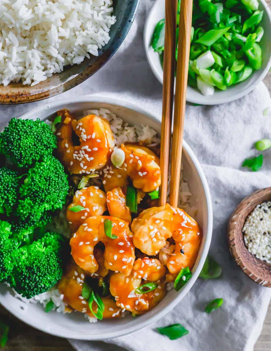 General Tso shrimp recipe served in a bowl with broccoli and rice.