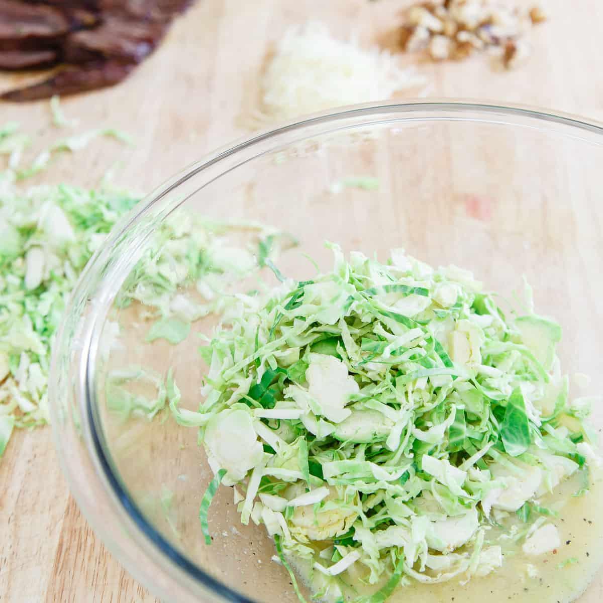 This Brussels Sprouts Salad is served alongside a grilled skirt steak, the perfect summer meal!