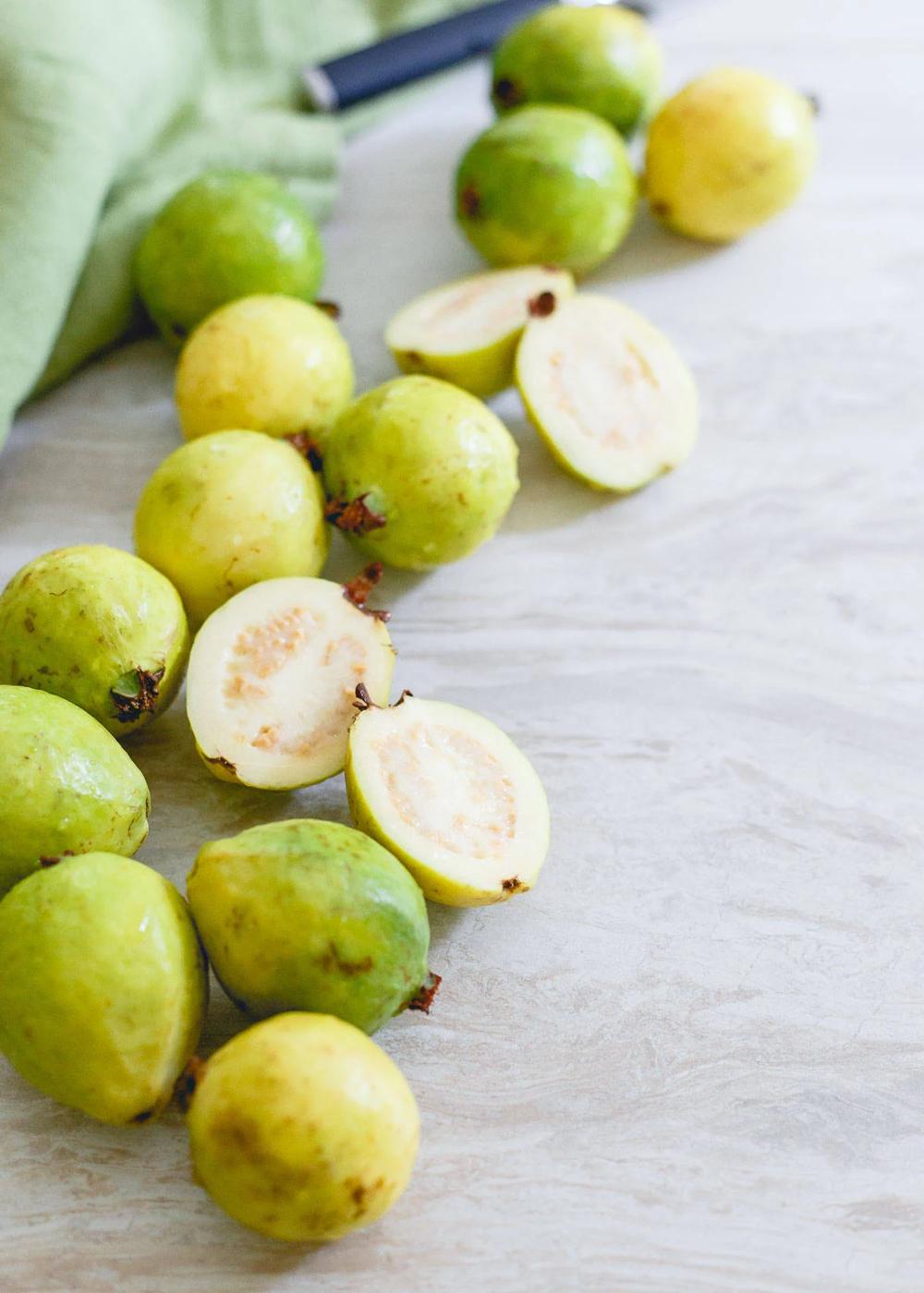 Ripe summer guava fruit goes so well with pineapple for a refreshing summer smoothie.