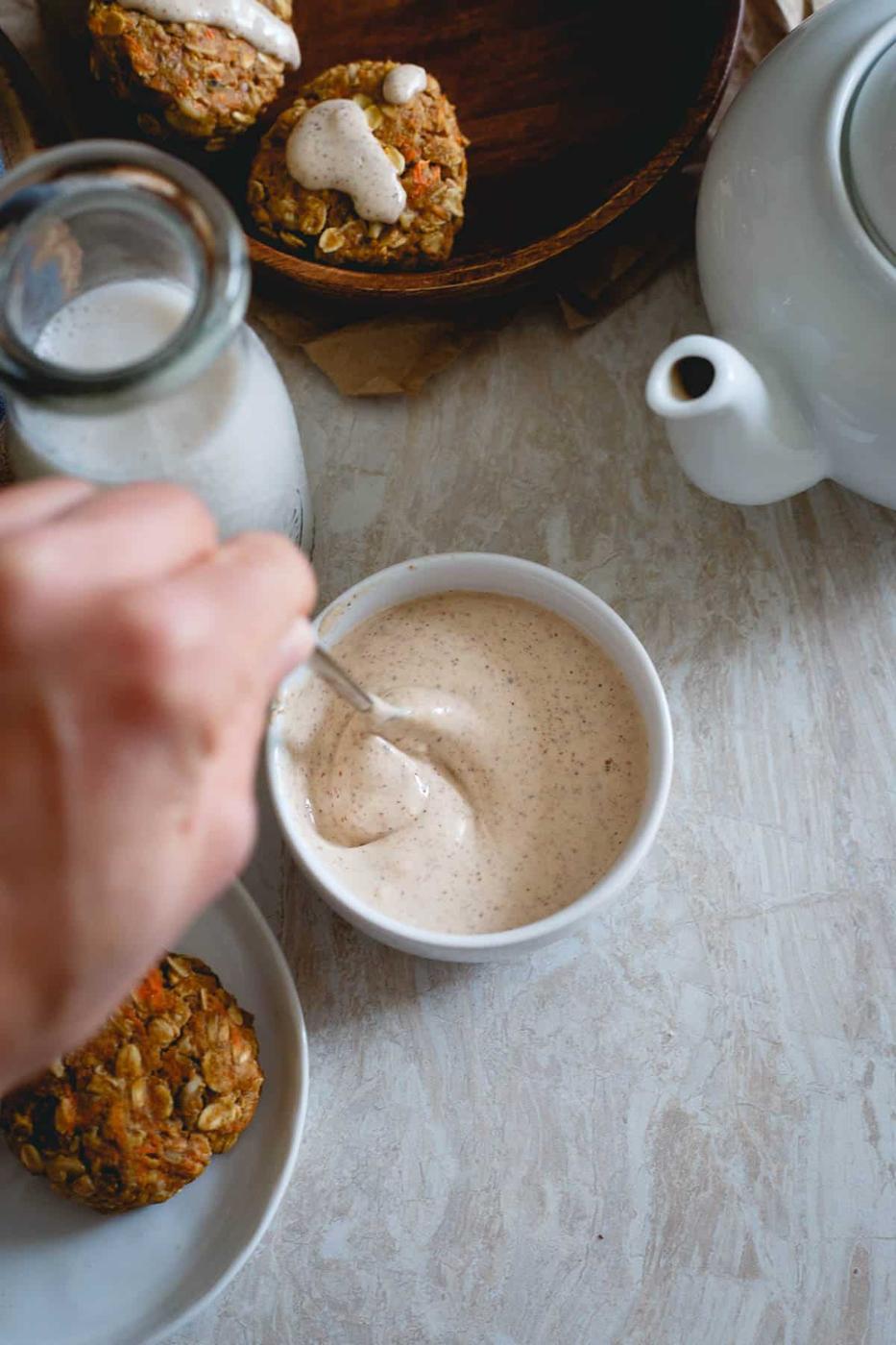 Sweet cream cheese almond butter icing makes these healthy carrot cake cookies even more delicious.