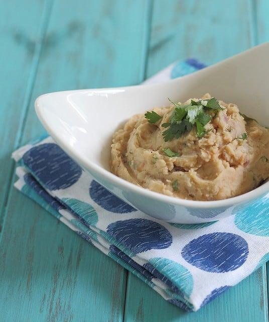 Homemade white refried beans make an easy and delicious side dish to any dinner.