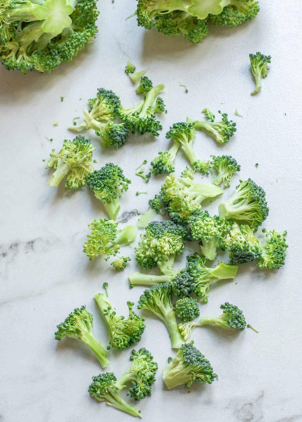 Broccoli florets on marble.