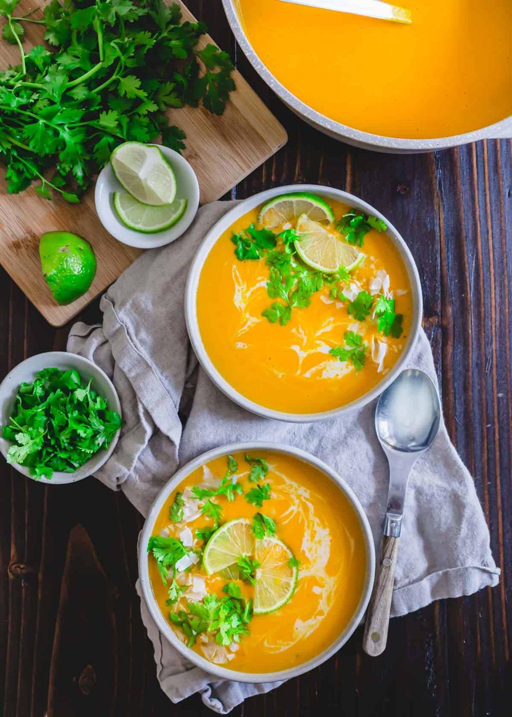 Creamy Thai buttercup squash soup in bowls.