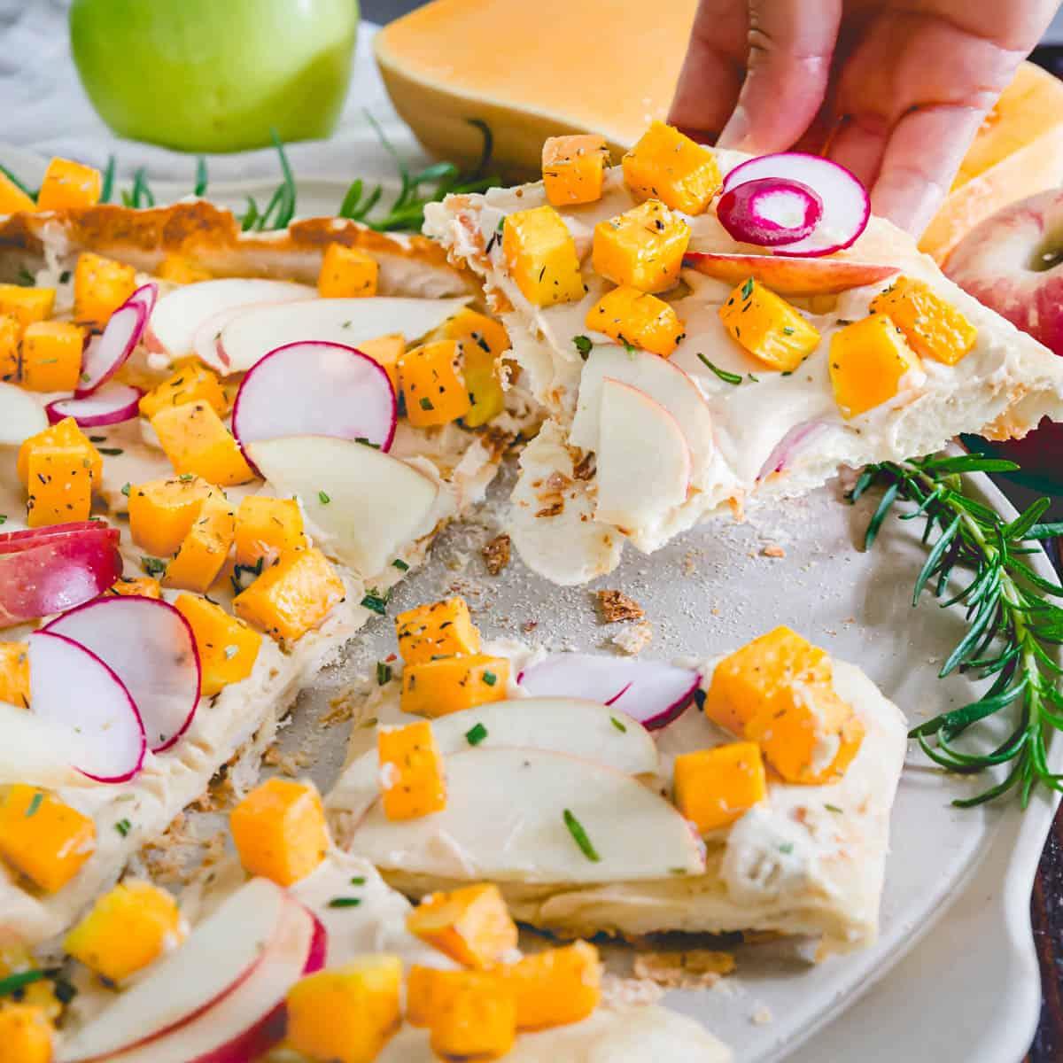 Grab a slice of hummus pizza if you're looking for a dairy-free, vegetarian pizza option.