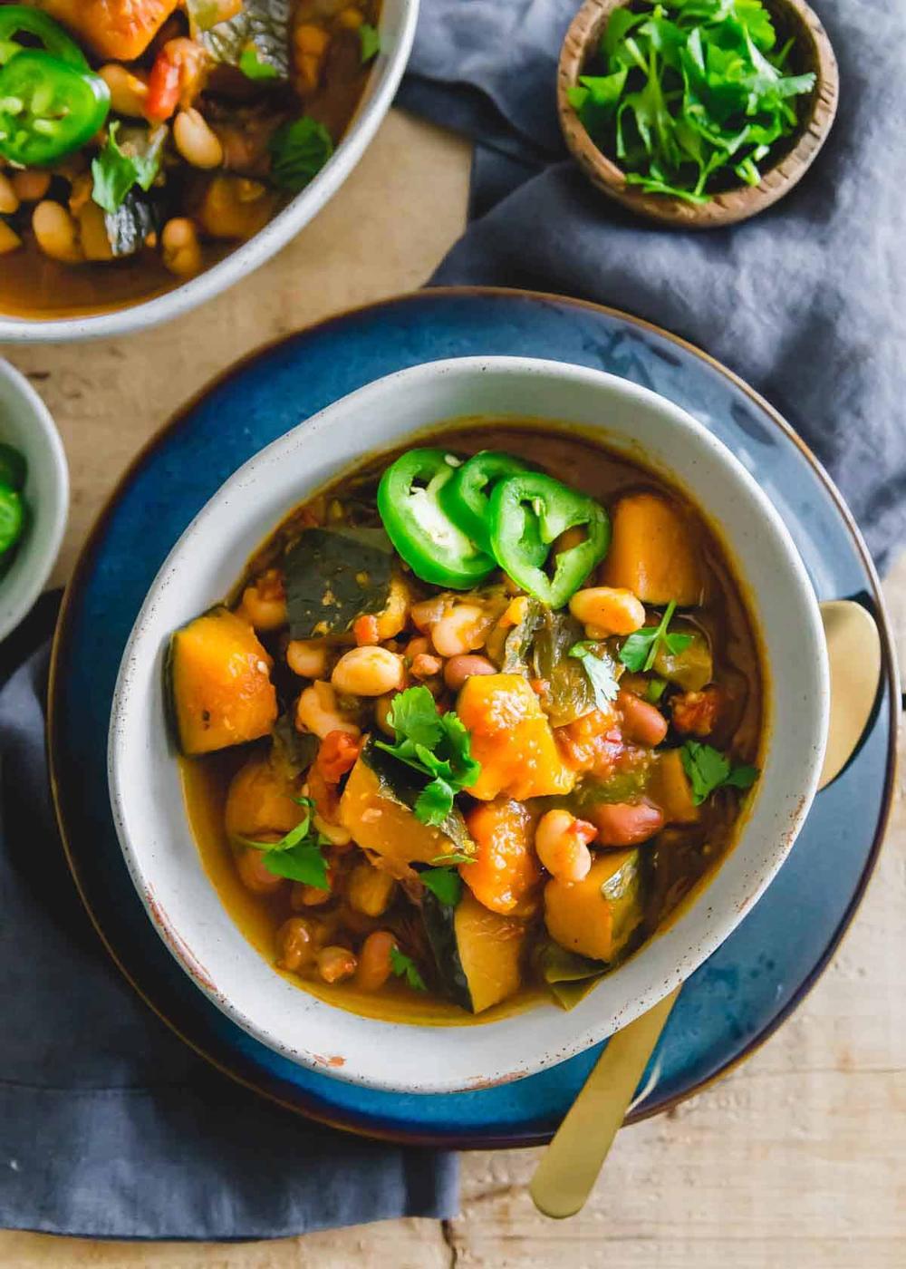 Hearty vegetarian chili with kabocha squash made in the slow cooker.
