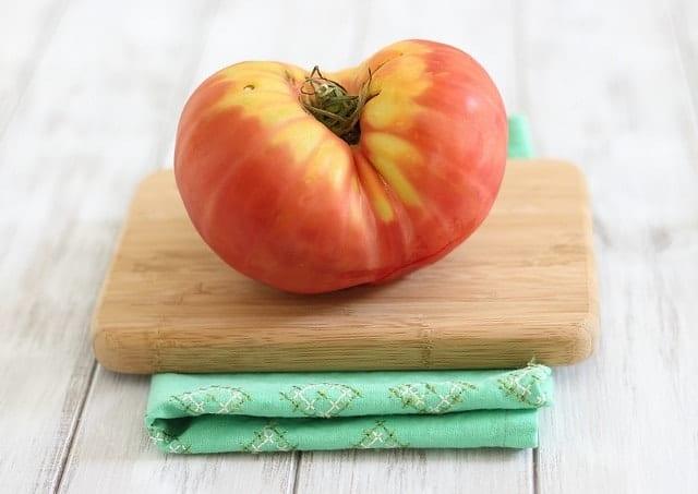 Kale and Sausage Stuffed Heirloom Tomato