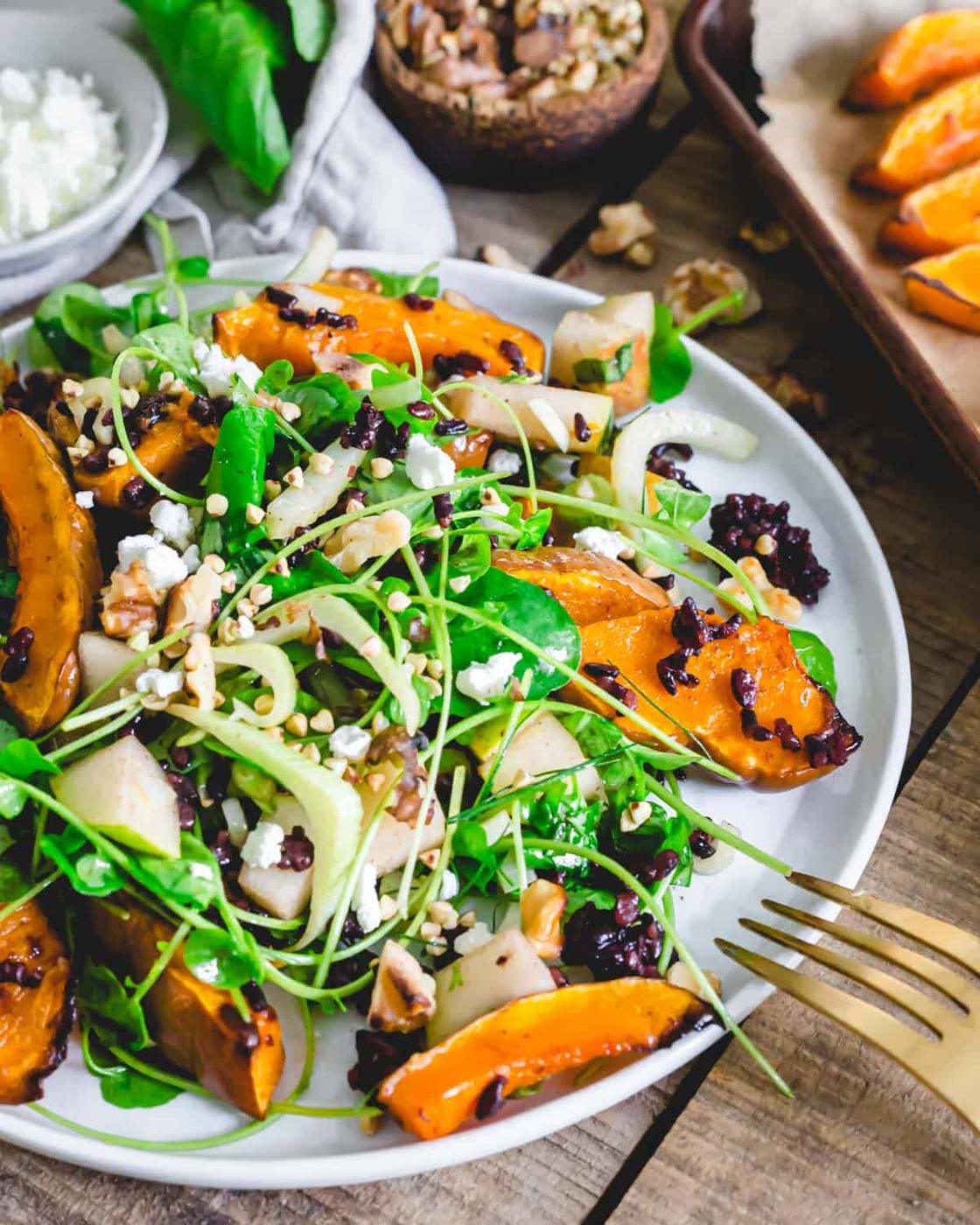Enjoy roasted koginut squash in this rice bowl with seasonal fall ingredients and a simple balsamic vinaigrette.