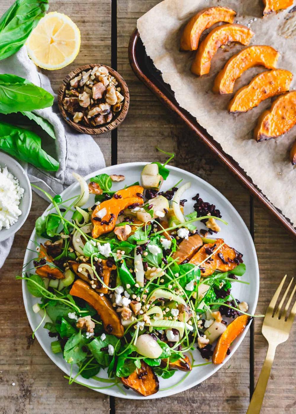 Watercress based salad and rice bowl with koginut squash, pears, walnuts, toasted buckwheat, goat cheese, fennel and wild black rice.