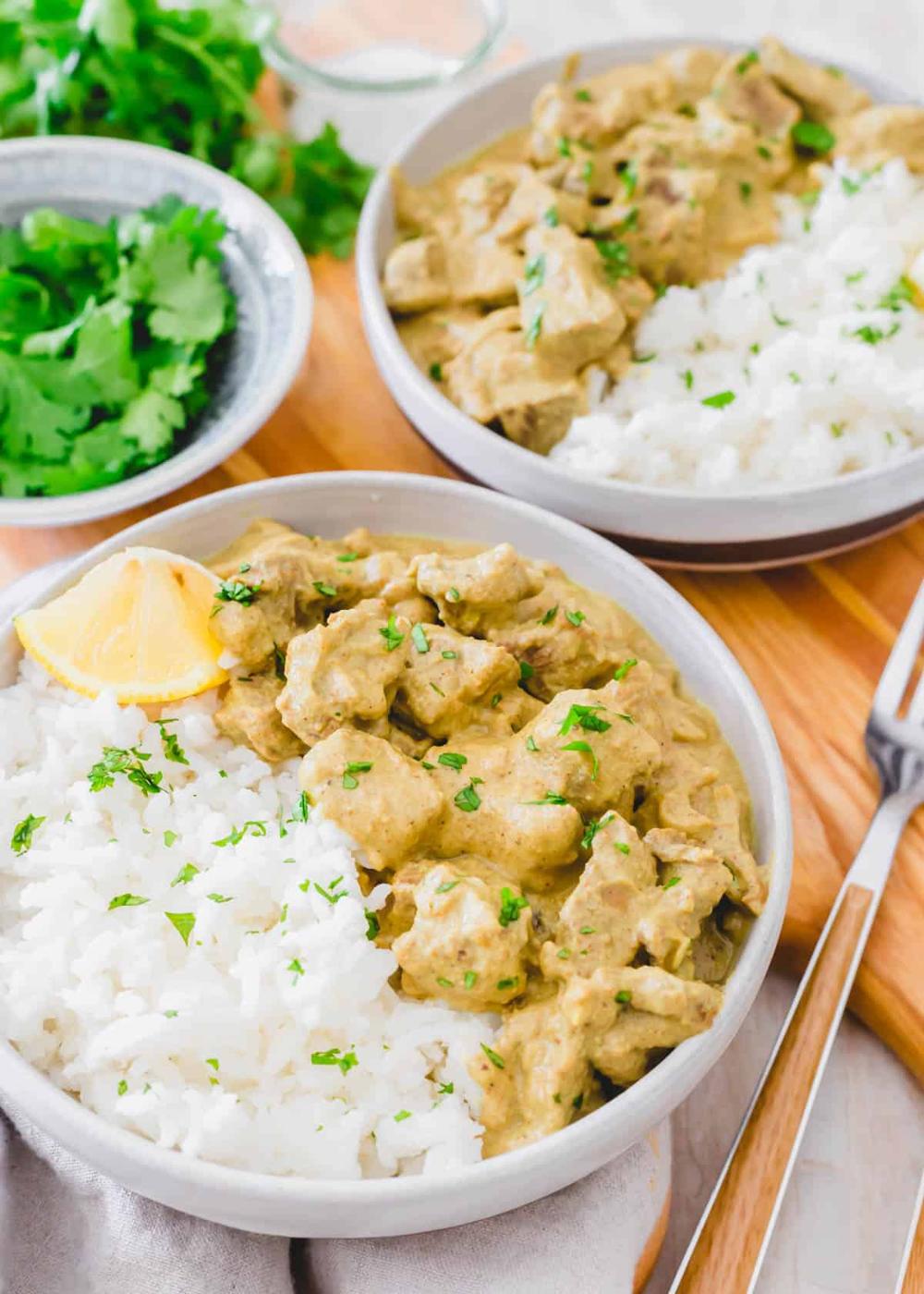 Lamb korma recipe using dairy-free coconut yogurt to marinate the lamb in a creamy cashew spice sauce.