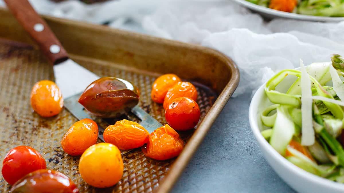 Roasted tomatoes add a little touch of sweetness to this lemony asparagus salad.