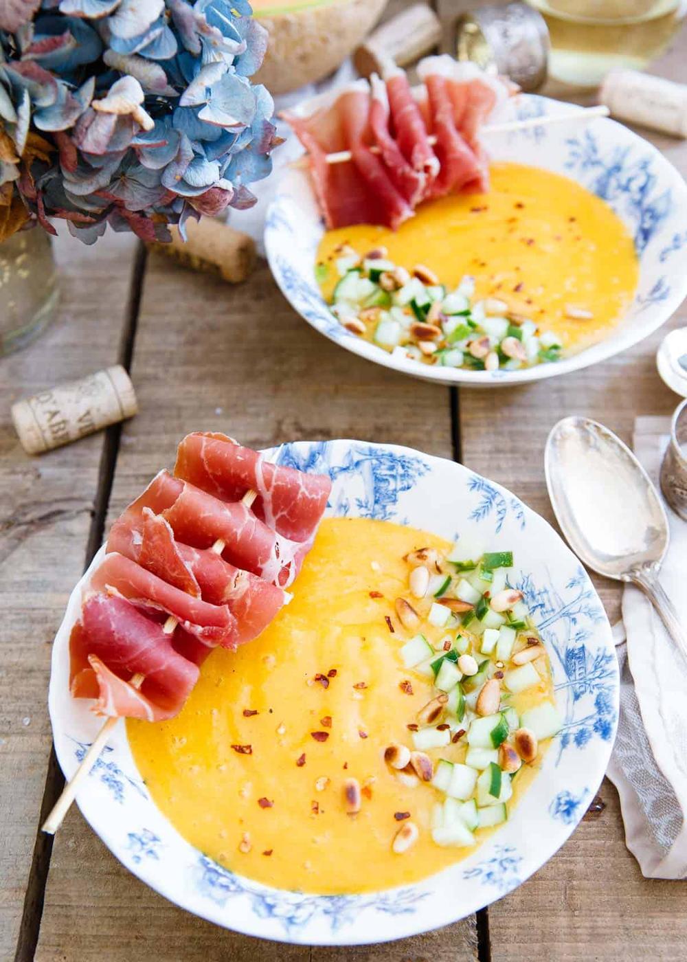 This Mango Melon Soup with Pickled Cucumbers and prosciutto skewers is a refreshing light summer dish.