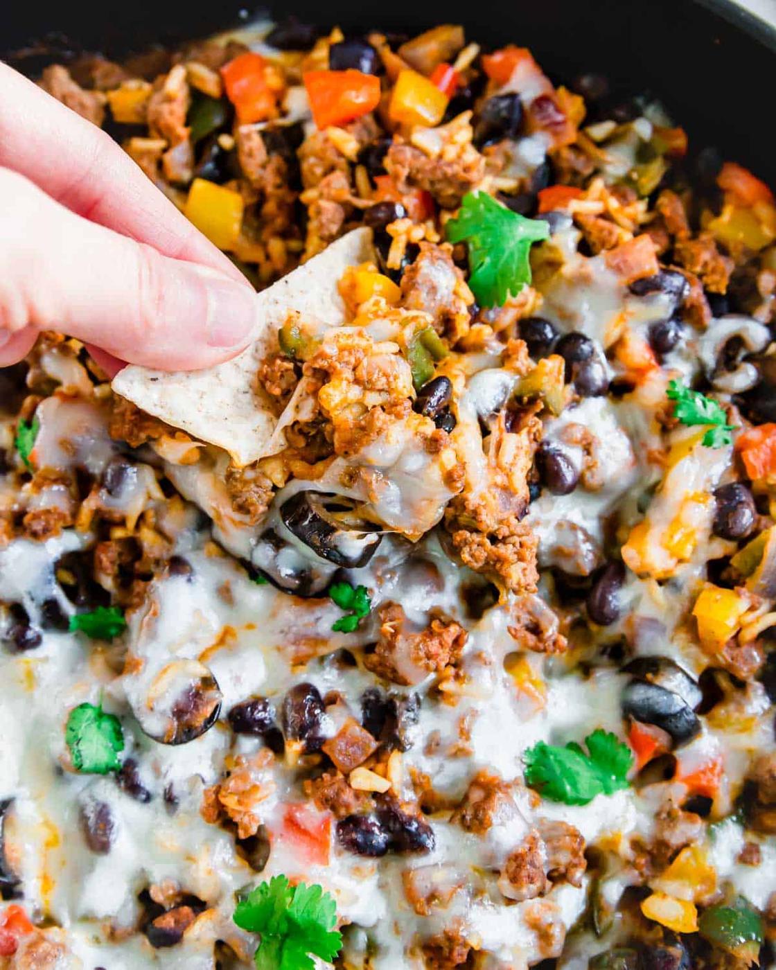Skillet Mexican ground beef recipe with a tortilla chip.