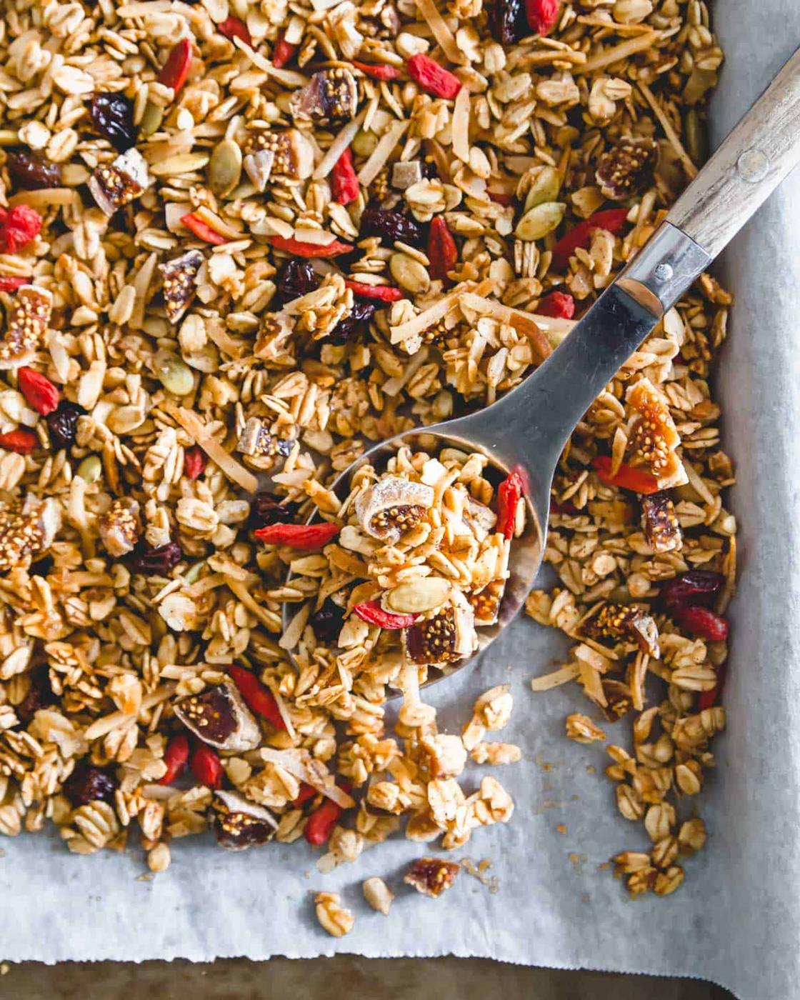 Gluten-free nut-free granola recipe baked with simple ingredients ready to be stored.