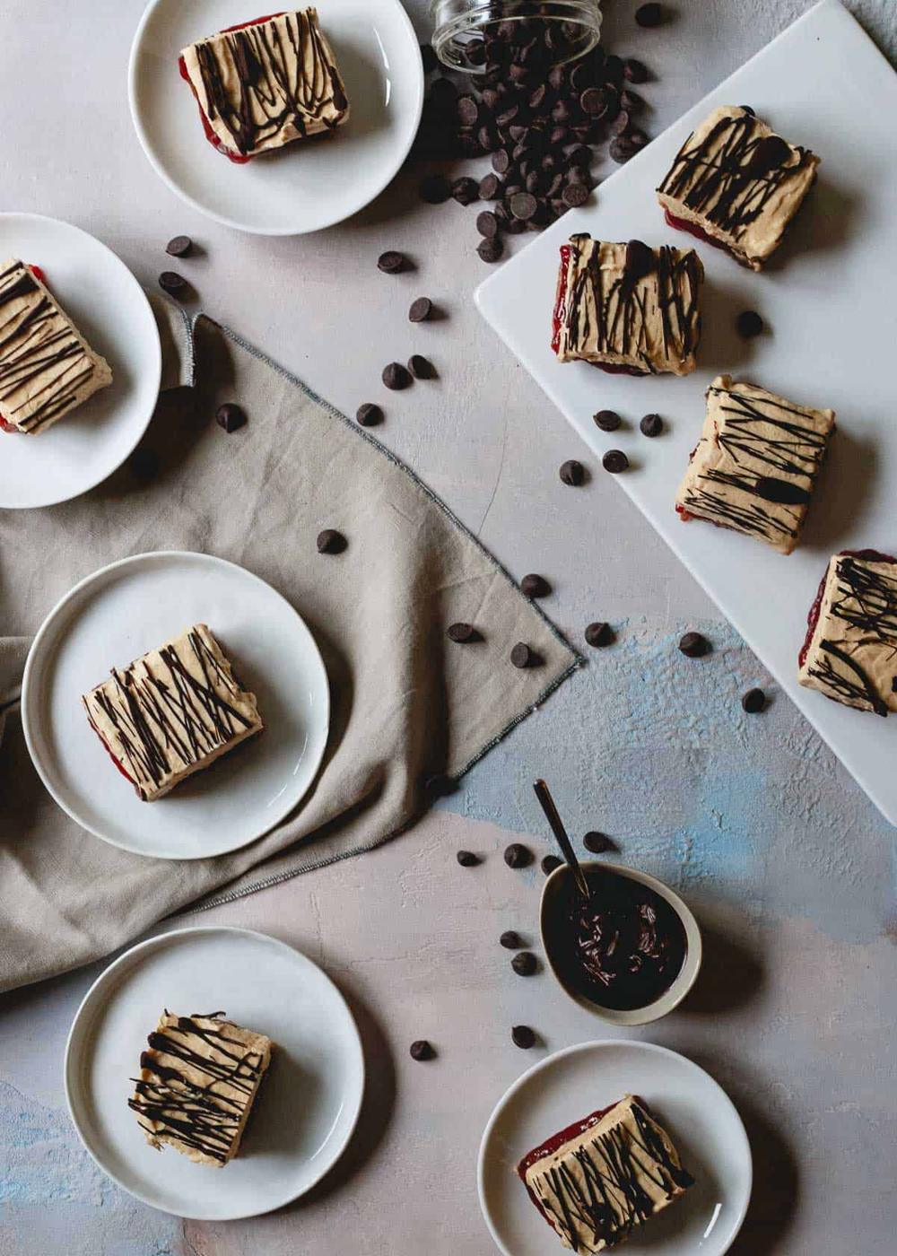 Peanut butter jelly frozen yogurt bars are a decadent yet healthier summer treat or snack.