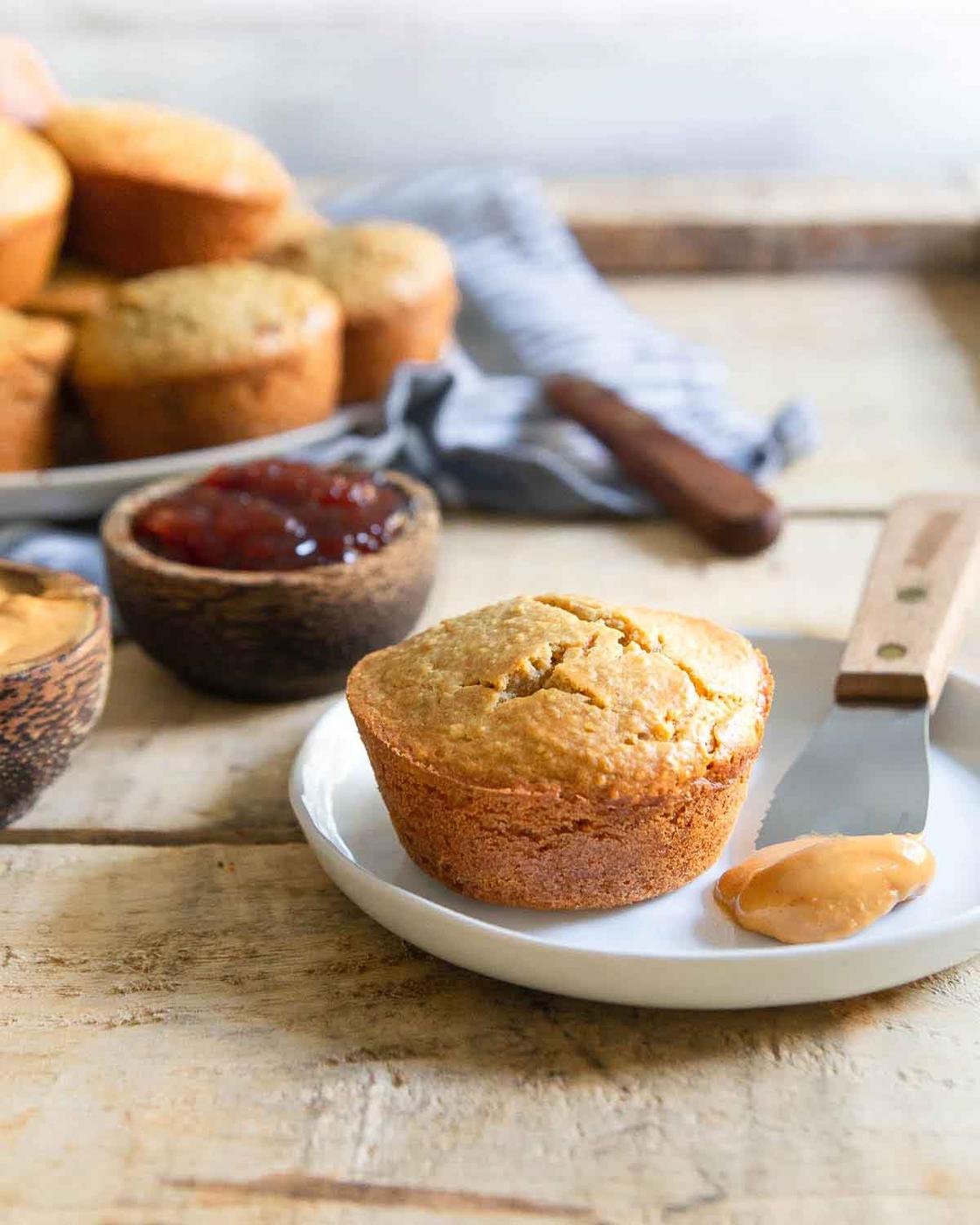 Tender peanut butter muffins with a surprise strawberry jelly center make the perfect snack.
