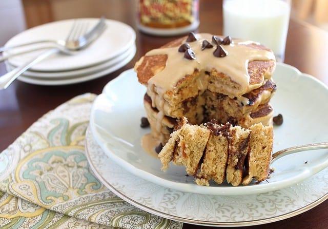 Peanut butter chocolate chip pancakes with peanut butter topping are doughy, fluffy and delicious for breakfast!