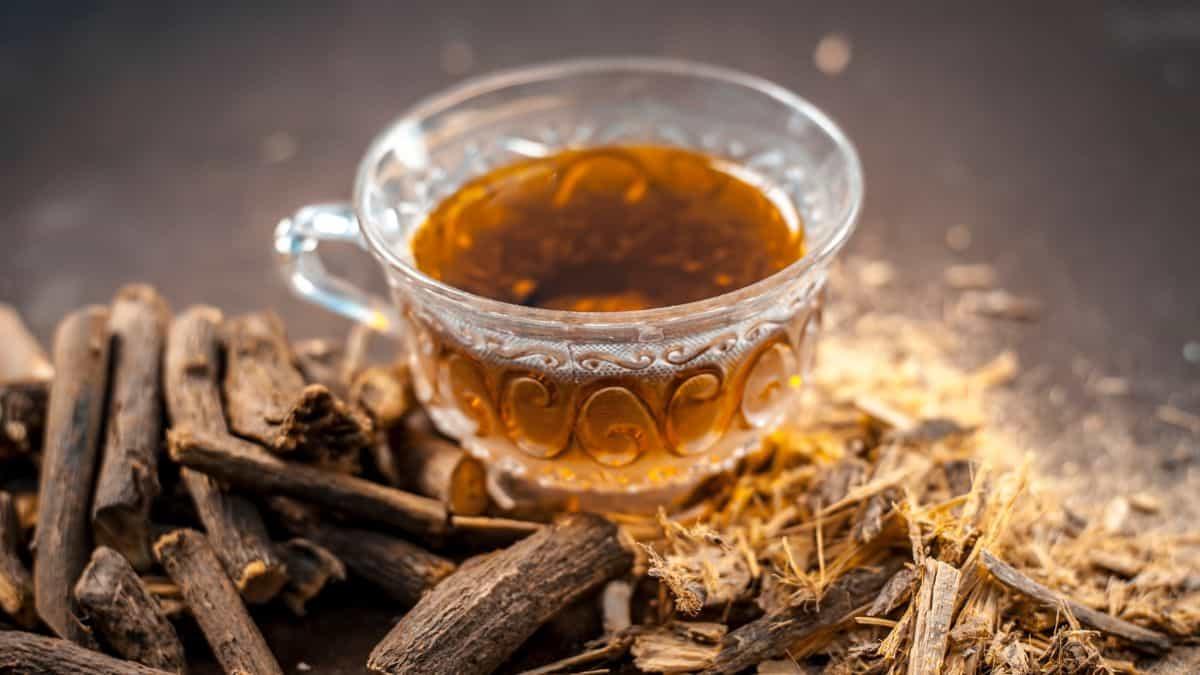 Licorice root tea served in glass cup.